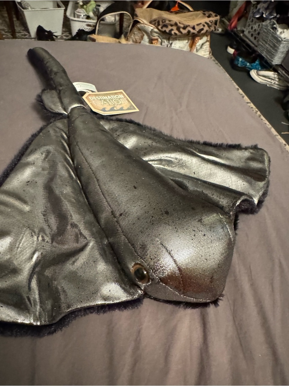 Silver and black stuffed animal. Sting Ray